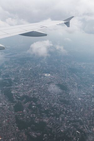 Kiev city with airplane window, Ukraineの写真素材