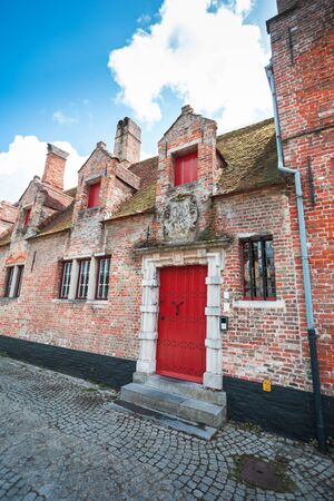 View of one of the many beautiful streets of Bruges, Belgiumの写真素材