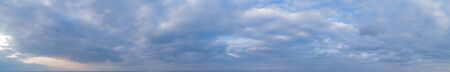 Panoramic view of evening sky. Large panorama of sunset skyの写真素材