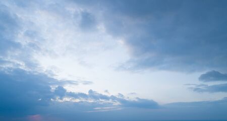 Beautiful sky with stretched clouds during twilightの写真素材