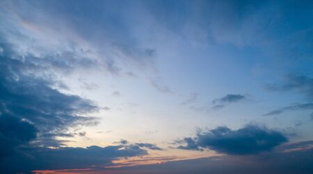 Beautiful sky with stretched clouds during twilightの写真素材