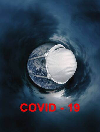 Concept Earth with a protective mask during a Covid-19 epidemic or coronavirus.の写真素材