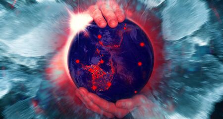 Female hands hold the globe with epicenters of infection Covid 19 with a bright blue halo.の写真素材