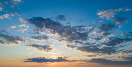 Sunset sky with multicolor cloudsの写真素材