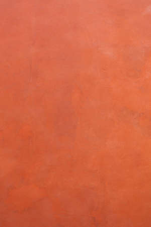 Terracotta microcement texture backgroundの写真素材