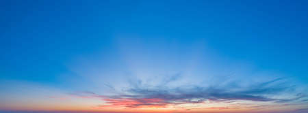 Large panorama with sunset sky with multicolor cloudsの写真素材