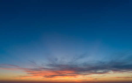 Large panorama with sunset sky with multicolor cloudsの写真素材