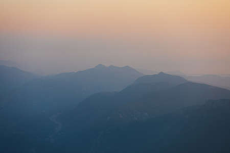 Panorama of the mountains at sunset.の写真素材