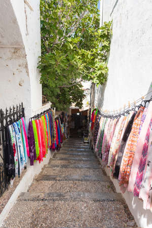 Traditional streets of Lindos with various small shops, Rhodes, Greeceの写真素材