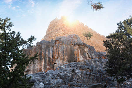 Acropolis in the city of Lindos - defensive walls below the cliffの写真素材