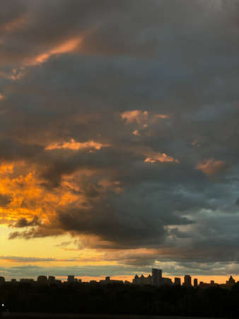 Beautiful sunset sky with a low cloudsの写真素材