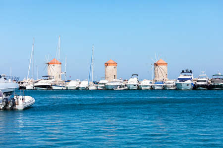 Windmills in the Mandraki port of Rhodes, Greeceの写真素材