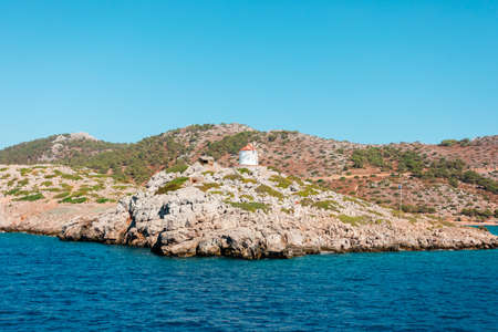 Windmill on the island of Symi in Greeceの写真素材