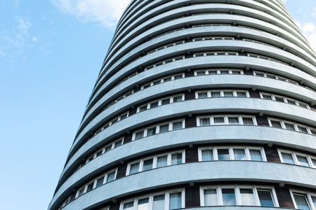 Modern architecture of a round building with concrete rings around the perimeterの写真素材