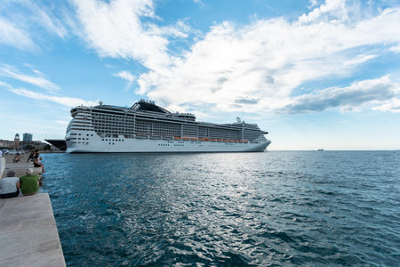 Cruise ship stands moored in the port of Triesteの写真素材