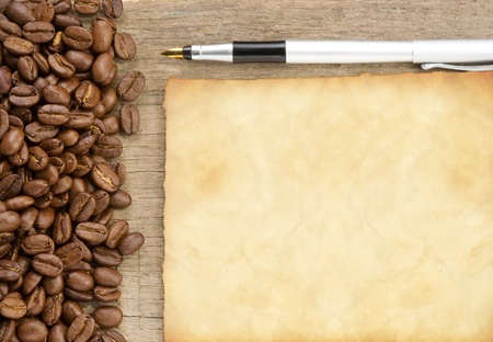 coffee beans and old paper texture parchmentの写真素材
