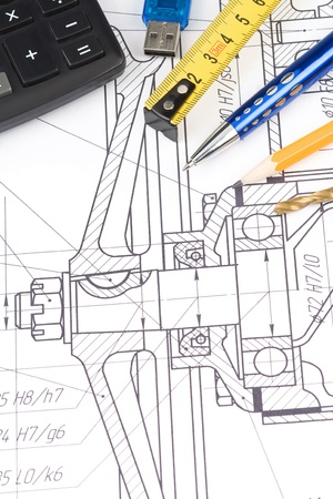 pen and pencil, calculator on drafting of coupllingの写真素材