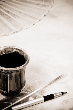 cup of coffee and feathersの写真素材