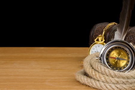 ship ropes and compass isolated on black backgroundの写真素材