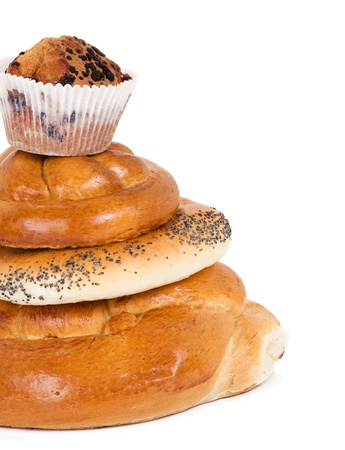 isolated cupcake, bread and bagel on whiteの写真素材