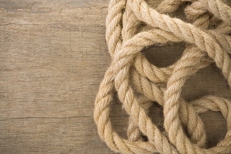 ship ropes on wood background textureの写真素材
