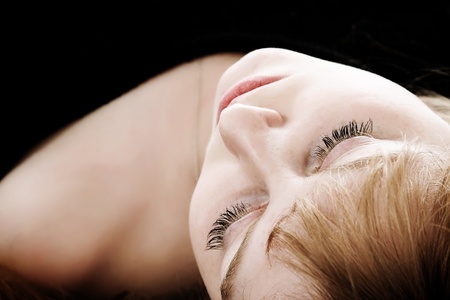 beautiful woman lying on back
