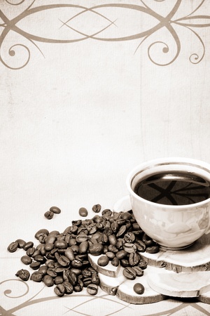 coffee beans and cup at woodの写真素材