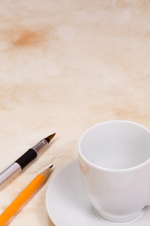 empty cup at paper textureの写真素材