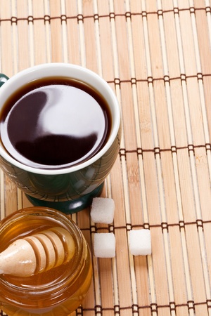 coffee and glass pots with honeyの写真素材