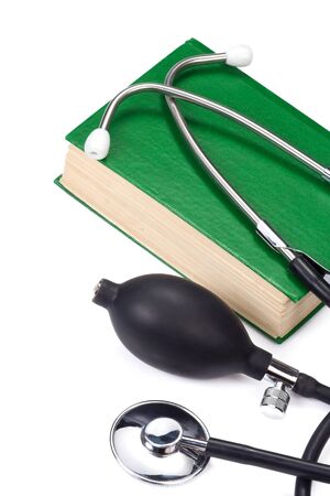 book and stethoscope isolated on white backgroundの写真素材