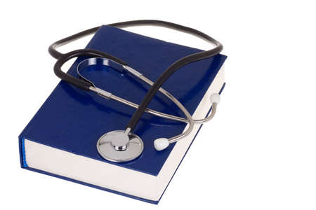 blue book and stethoscope on whiteの写真素材