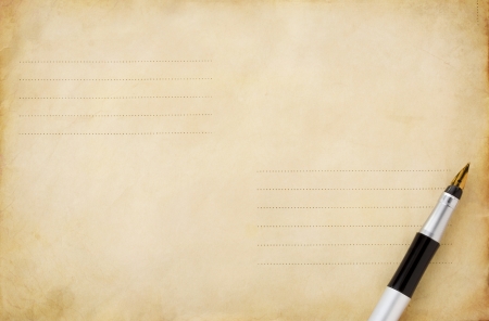 ink pen on old postal envelope backgroundの写真素材