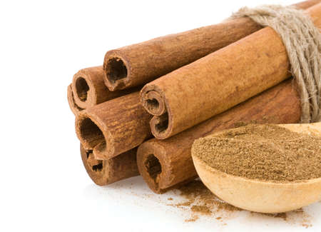 cinnamon sticks and powder isolated on white background