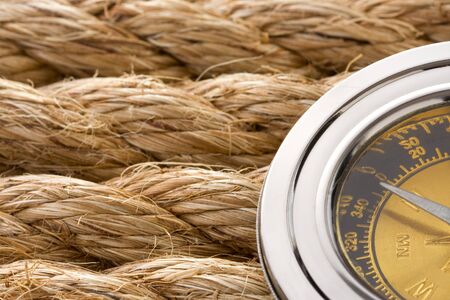 ship ropes and old compass
