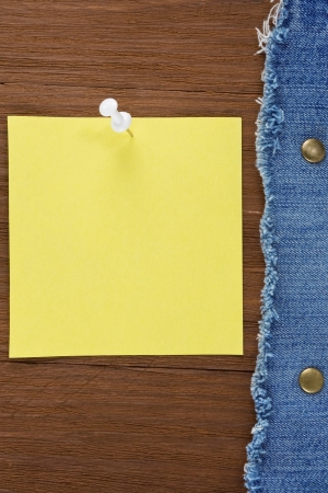 blue jean on wood texture backgroundの写真素材