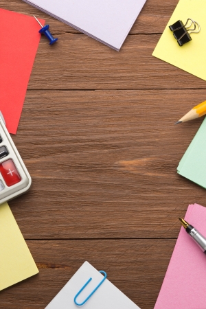 office supplies on wood backgroundの写真素材