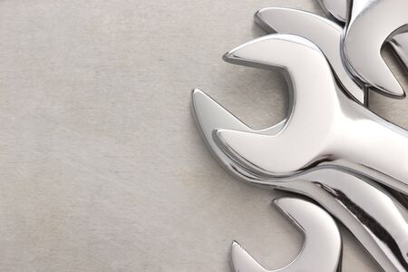 wrench tool at metal  background