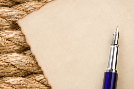 old paper background parchment at ship ropesの写真素材