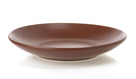 empty ceramic plate isolated on whiteの写真素材