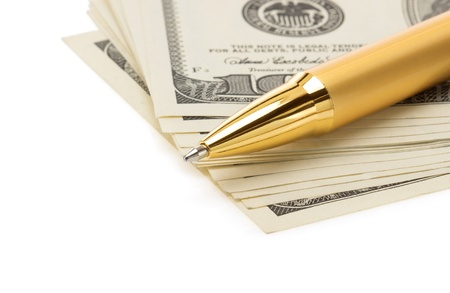 pen on dollar money banknotes isolated at white backgroundの写真素材