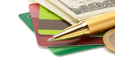 pen and dollar money banknotes isolated at white backgroundの写真素材