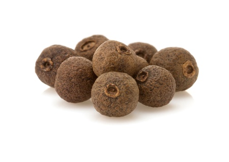whole allspices isolated on white backgroundの写真素材