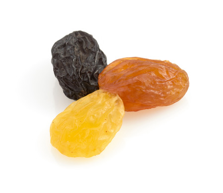 raisins fruit isolated on white の写真素材
