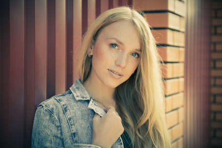 beautiful young woman portrait outdoorsの写真素材