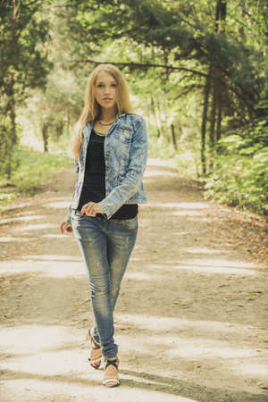 beautiful young woman portrait outdoorsの写真素材
