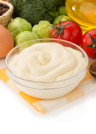 mayonnaise sauce in bowl isolated on white backgroundの写真素材