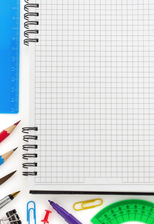 notebook and office accessories isolated on white backgroundの写真素材