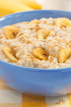 bowl of oatmeal tablecloth backgroundの写真素材