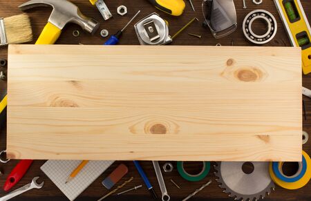 set of tools and instruments on wooden background