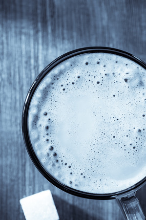 cup of coffee on wooden backgroundの写真素材